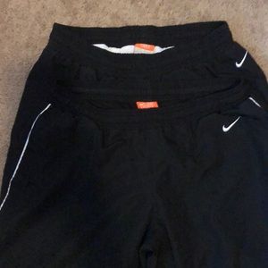 Lot of 2 Nike wind breaker bottoms